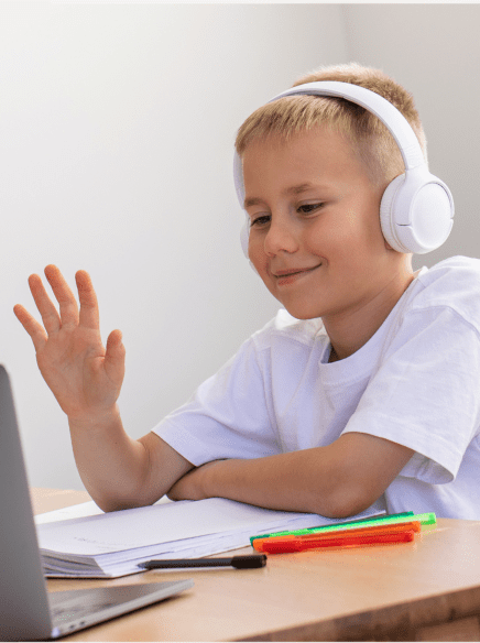 boy taking class online with bilingual bridges