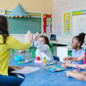 Teacher and student sharing a high five in a preschool bilingual classroom